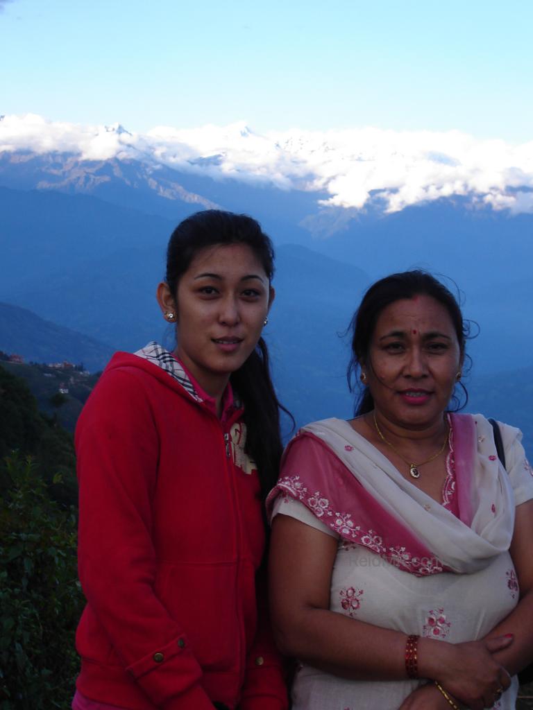 Urika and Mamu, with Himalayan Mountains as a backdrop