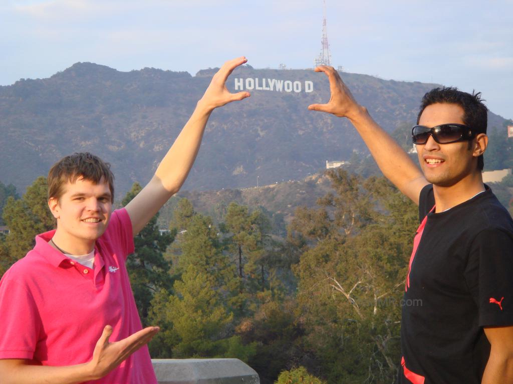 Me and Sumedh posing with the Hollywood sign behind