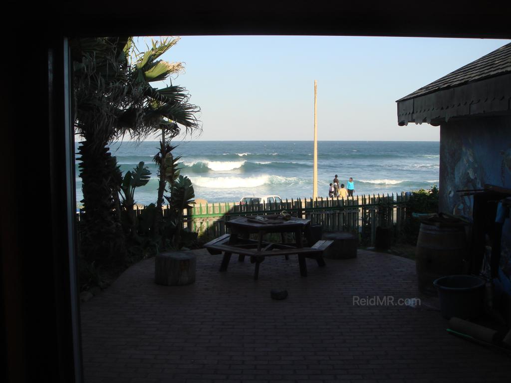 View from my pillow, the open door way, and the ocean further out.