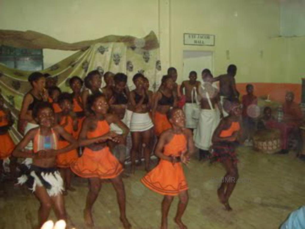 Teenagers performing for a dance for us at the township school place. Drums on the side.