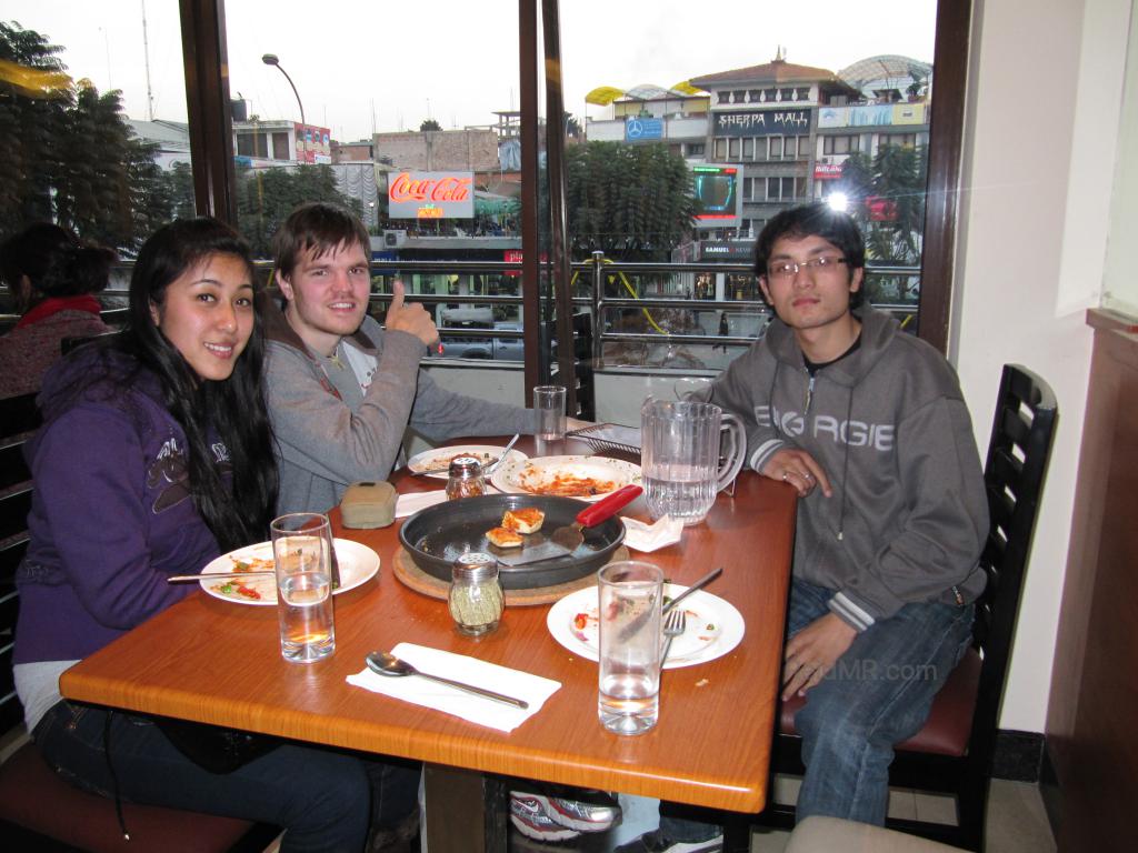 Urika, me, Bipul eating at Pizza Hut in Kathmandu