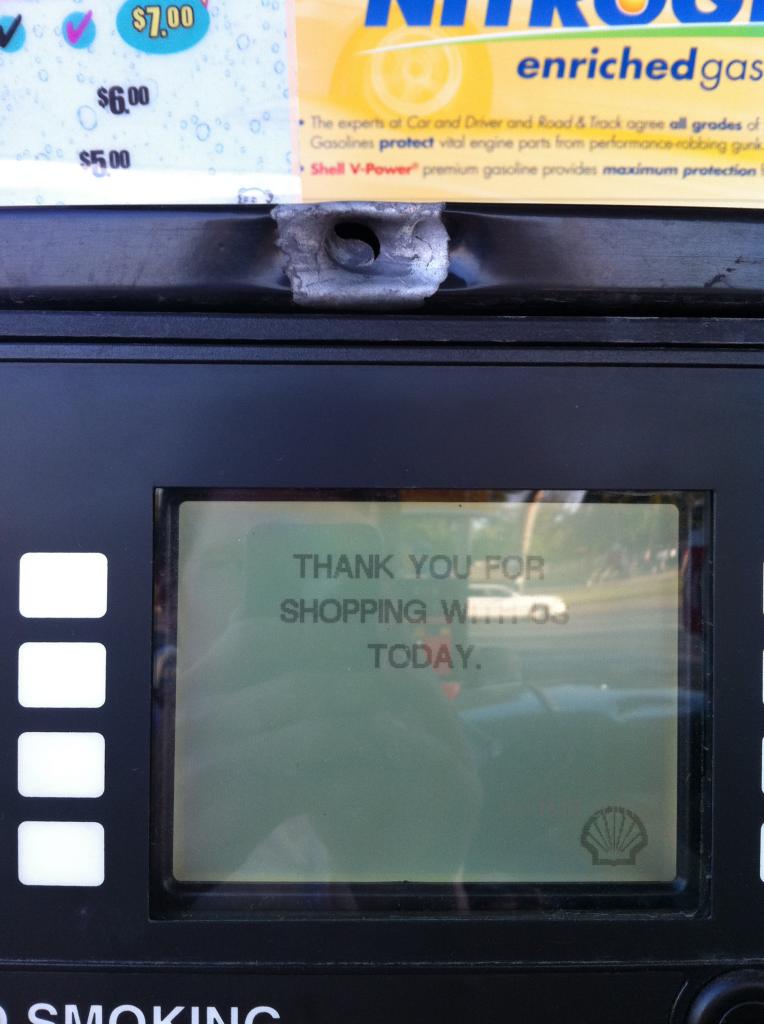 Gas pump with a big bullet hole in it in Columbus Ohio