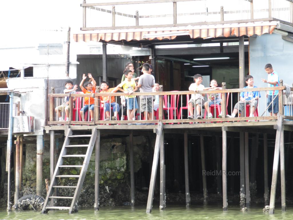 The Tai O school on stilts, with students on the deck