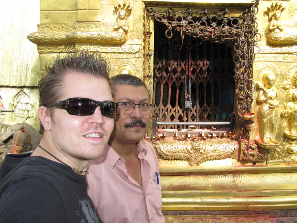 In front of a temple structure with dad