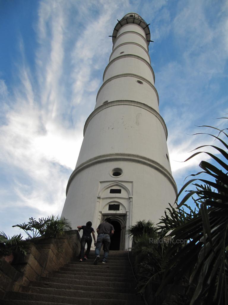 Dharahara, a tower with nice blue and white sky behind