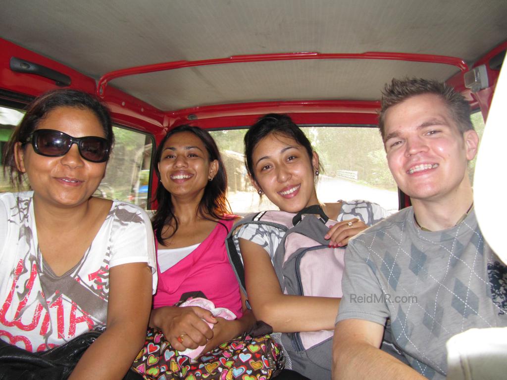 Likee, Rojina, Urika and I sitting in the back of the taxi, all happy. 