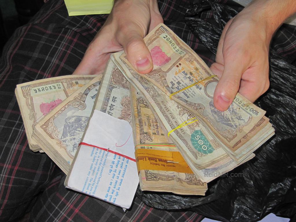 Me flashing some cash, Nepalese Rupees, about 2-300,000