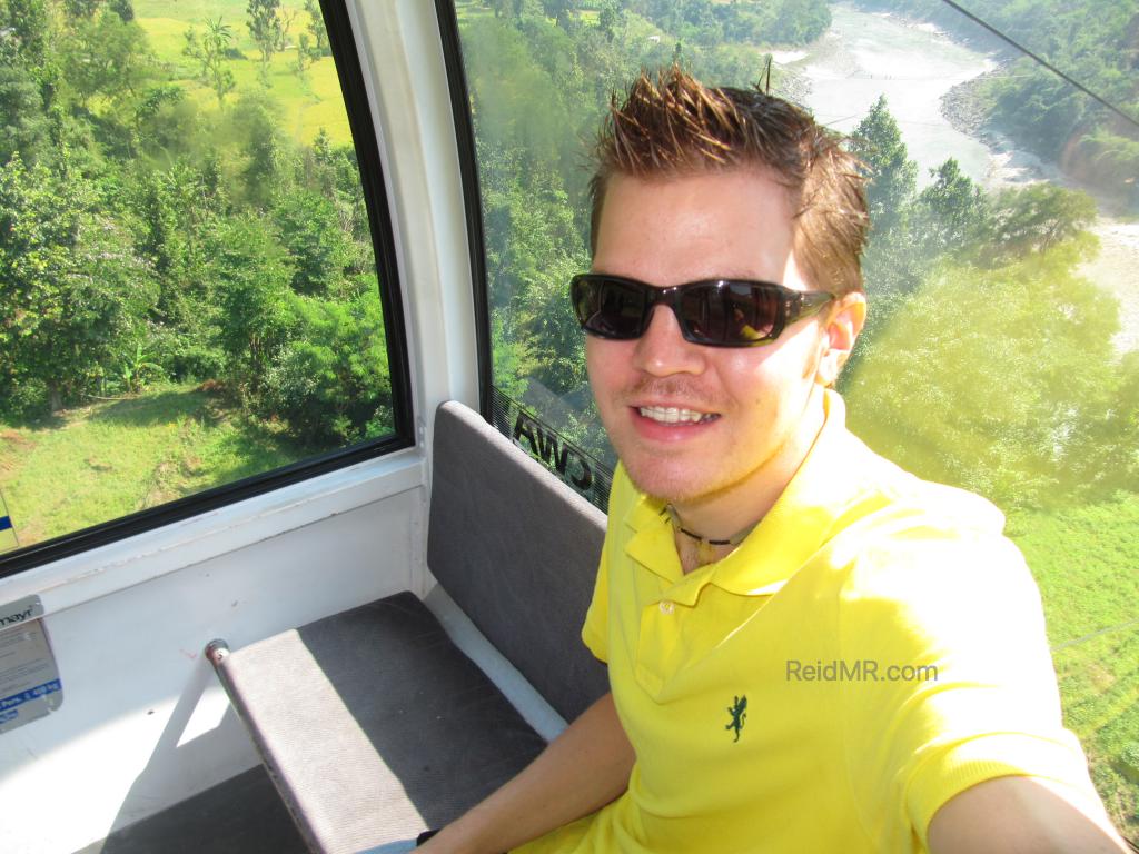 In the Manakamana cable car, with the greenery outside