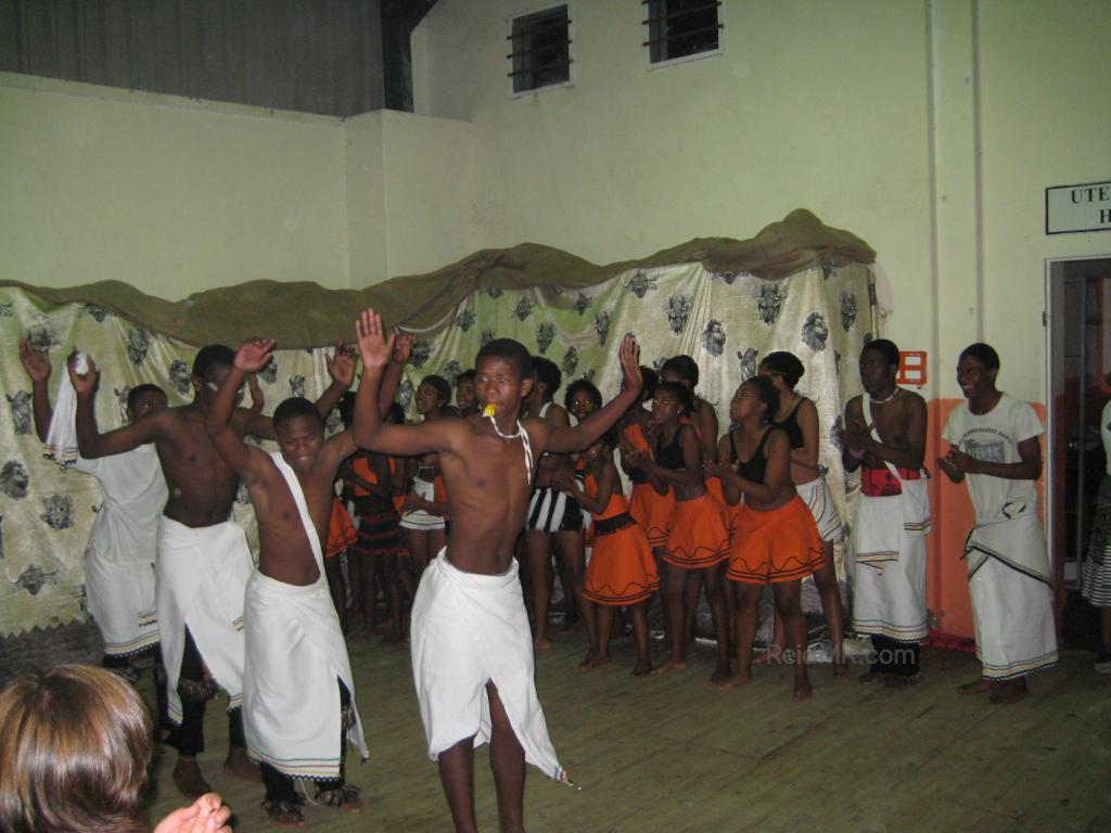 Teenage dancers in the township at our volunteer place. People on the side.