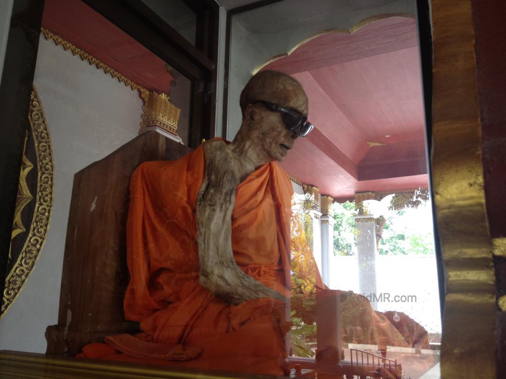 The mummified monk in the glass showcase at Kunaram Temple. 