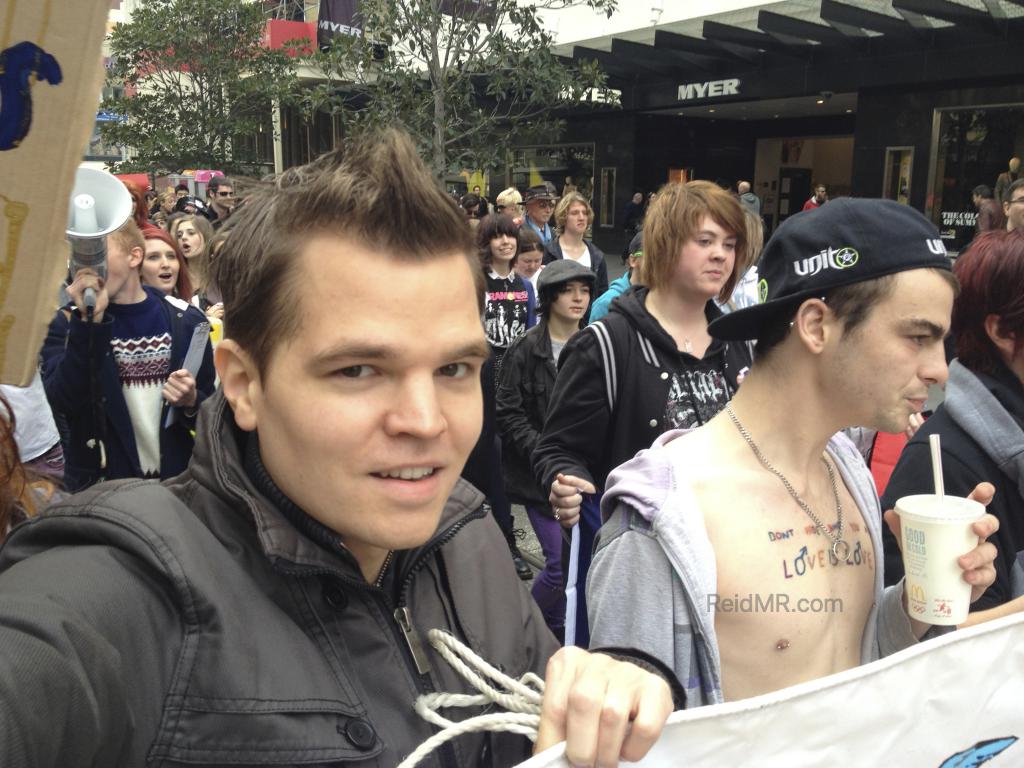 Me marching in the marriage equality rally holding the sign.