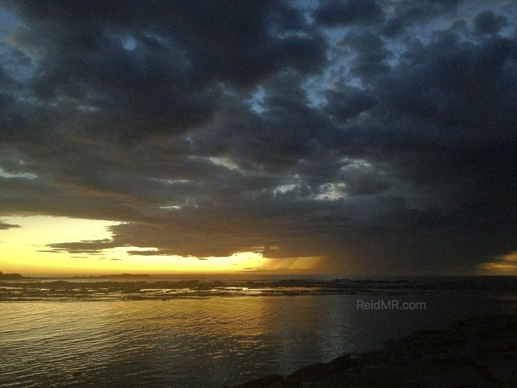 My most memorable sunrise over the ocean with stormy clouds.